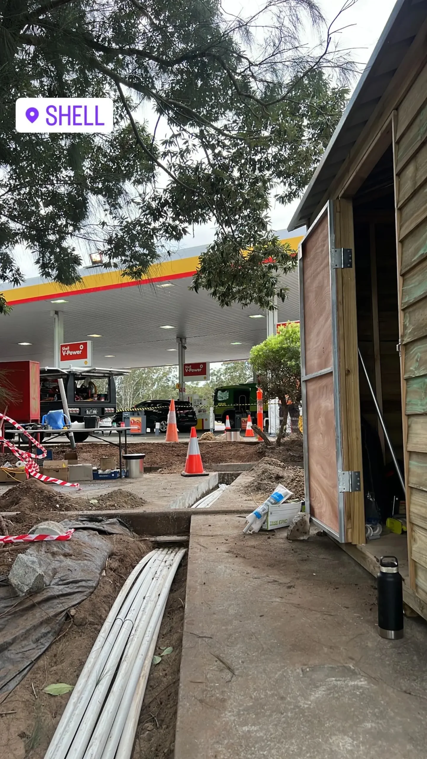 Underground electrical conduit installation at a Shell service station