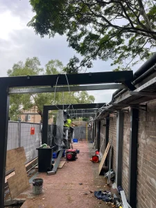 Electrical work in progress on a covered walkway build at St Maroun's College, Marrickville